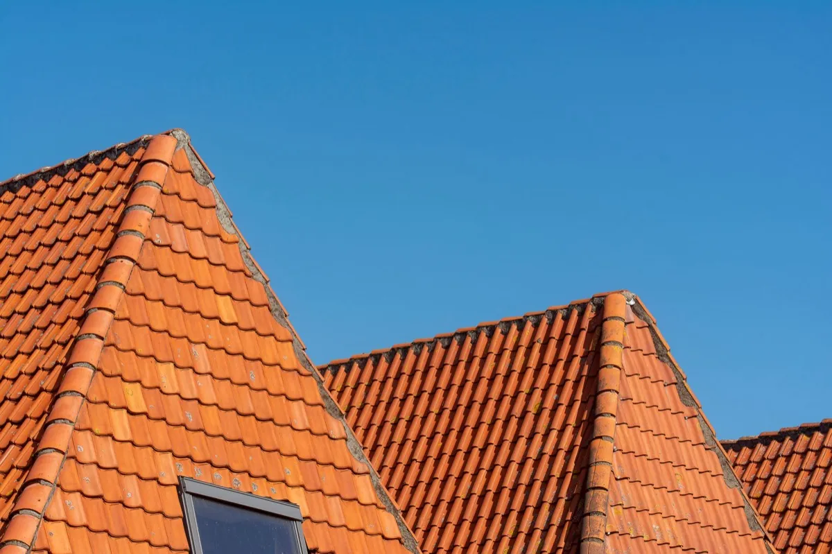 Clay barrel tile rooflines on homes in Amarillo, TX