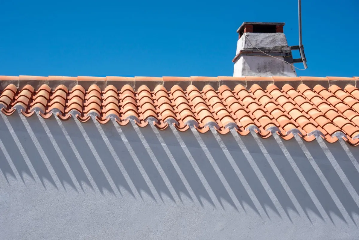 Roof ridge line and chimney on a home in Amarillo, TX